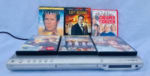 lot 200 image: Zenith DVDCD Player Model #DVB412 and 6 DVDs