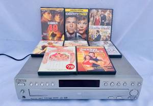 lot 209 image: GE Digital 5 Disk DVDVideo CD Player model DGE505N and 8 DVDs