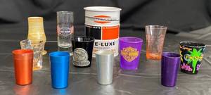 lot 125 image: Collection of Shot Glasses - Harley Davidson, Halloween, Aluminum and a few others
