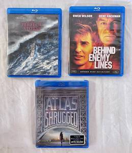 lot 127 image: The Perfect Storm, Behind Enemy Lines and ATLAS Shrugged (unopened) Blue Ray