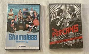 lot 128 image: The Americans Complete 1st Season and Shameless Season 1 & 2 Unopened DVDs