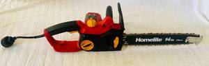 lot 124 image: Homelite 14 Electric Chainsaw model #UT43103