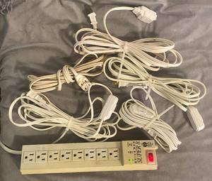 lot 173 image: Super 8 Surge Protector and 5 Extension Cords