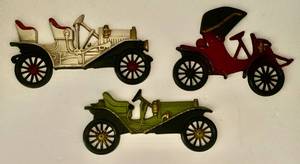 lot 112 image: Vintage Hand Cast Metal Antique Car Wall Dcor by Midwest
