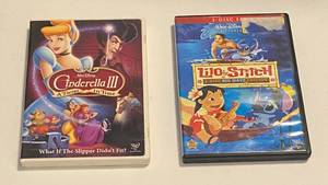 lot 117 image: Cinderella III and Lilo & Stitch DVDs