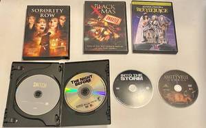 lot 115 image: 7 DVDs