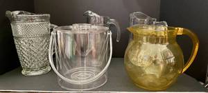 lot 108 image: 3 Glass Pitchers ice bucket and Gold Plastic picture