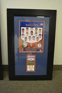 lot 7 image: Texas Rangers 2012 Framed Opening Day Ticket and Poster 21 x 34