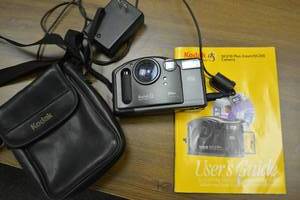 lot 65 image: Digital Camera Lot Kodak DC210 Plus Zoom Camera with Users Guide and Bag