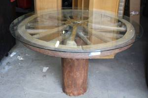 lot 5 image: Wagon Wheel Table with 4 Ft. Round Glass Top 32 Tall