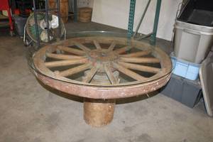 lot 744 image: Wagon Wheel Table with 4 Ft. Round Glass Top 32 Tall