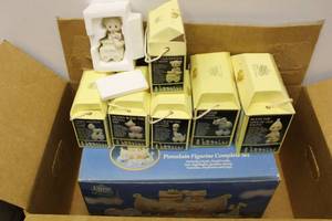 lot 27 image: Precious Moments Collection Birthday Train Figurines, and Noahs Ark Nightlight Set