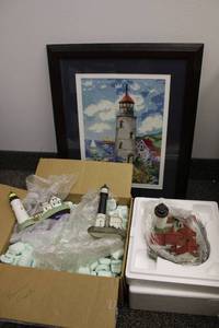 lot 30 image: Harbour Lights Collection Lighthouse Figurines and Embroidered Lighthouse Framed Wall Art