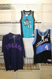 lot 253 image: NEW Cleveland Kemp #4 Jersey size L, NEW Pistons Hill #33 Jersey size S, NEW Chicago Cubs Polo Shirt with Patch Size 2XL