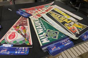 lot 262 image: Cincinnati Reds, Milwaukee Brewers, Pittsburgh Pirates Pennants, Boston Red Sox Pennant and Decals