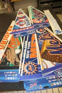 lot 264 image: New York Mets, Baltimore Orioles, Montreal Expos, Toronto Blue Jays Pennants and Yankees Decals