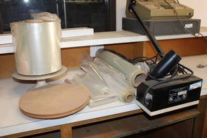 lot 305 image: Shrink Wrap System Cutter, Shrink Wrap and Heat Guns