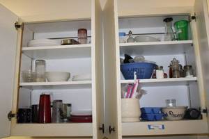 lot 176 image: Kitchen Lot Plates, Glasses, Mugs, Ice Cube Trays, Salt and Pepper Shakers, Marshall Pottery Popcorn Bowl