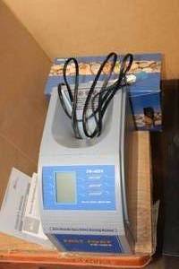 lot 420 image: Fast Sort Coin Sorter and Paper Coin Wrappers