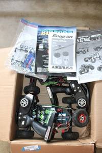 lot 436 image: 2 Desert Eagle-3 Remote Control Trucks and Remotes as shown