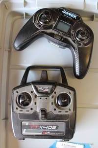 lot 443 image: LaTrax Remote and Tactic TTX402 Remote