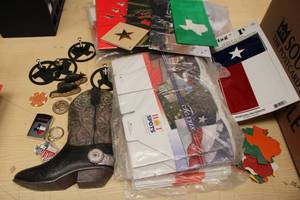lot 462 image: Texas Lot Cast Iron Boot, Set of Cabinet Pulls, Boxes, Decals and More