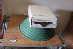 lot 504 image: Christmas Tree Stand Screwed into Board and Paper Towel Dispenser