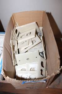 lot 513 image: Ivory Switch Plates and Outlets