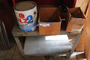 lot 531 image: boxes, paint and metal frame piece, with large amount of allen wrenches, kilz paint and backup battery