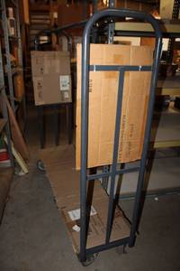 lot 560 image: Rolling Clothes Rack - 6 Wheel Base