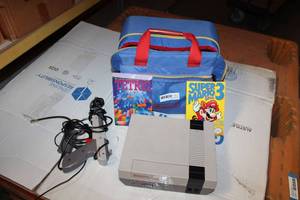 lot 571 image: Nintendo Entertainment System and Games