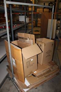 lot 612 image: Rolling Clothes Rack and Boxes