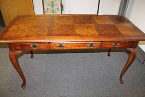 lot 69 image: Office Desk by National Mt. Airy 62W x 28D x 30.5 H with alternating square inlay and Cabriole Legs