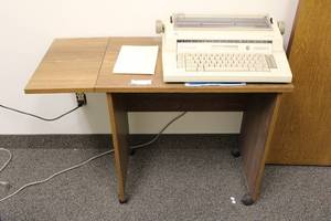 lot 74 image: Minolta EW251 Typewriter and Rolling Drop Leaf Typewriter Desk 36.5 W x 16D x 26.5H