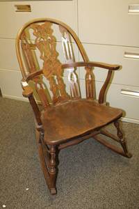 lot 82 image: Antique Wooden Rocking Chair (Writing on Chair reads Mary Belle Russell about 1900)