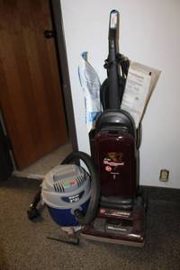 lot 94 image: Hoover Floor Vacuum With Extra Filter Bags and Small Shop-Vac 2.5 Gal.
