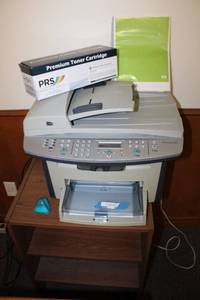 lot 107 image: HP Laserjet 3055 Printer with Extra Toner Cartridge and Small Table 20W x 16D x 27H