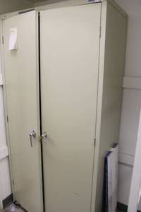 lot 136 image: 2-Door Metal Locking Cabinet with Key 3Ft.W x 18D x 6Ft.H  CONTENTS NOT INCLUDED