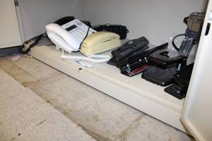 lot 142 image: Office Supplies 3-Hole Punches, Desk Phones, Electric Pencil Sharpeners