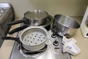 lot 182 image: Kitchen Lot Pans with Lids, Mixing Bowl, Small Griddle Pan and Texas Ceramic