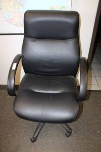 lot 190 image: Black Cushioned Rolling Office Chair with Adjustable Height as shown