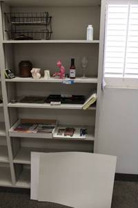 lot 193 image: Misc. Lot Poster Board, Wire Bins, Cast Iron Flag Paper Weight, Nature Bookmarks, Texas Mouse Pad and More