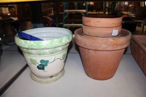 lot 740 image: Planters as shown