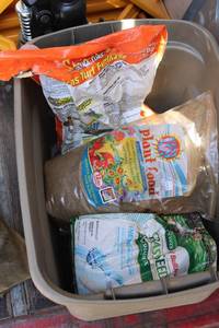 lot 1023 image: Plant Food, Grass Seed, GrubEx and Fertilizer Bags - 2 Tubs