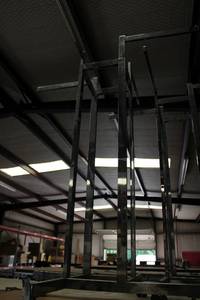 lot 611 image: Chrome Display Rack with 4 Arms on Wheels