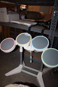 lot 665 image: Nintendo Wii Drum Set and Guitars