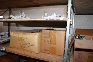 lot 702 image: Slat Wall White Brackets and Hooks