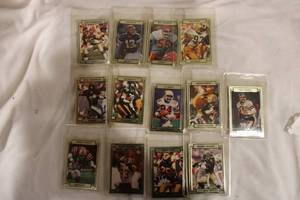 lot 1048 image: Football Cards Includes Tim Worley, Robert Massey, Jim Kelly and More
