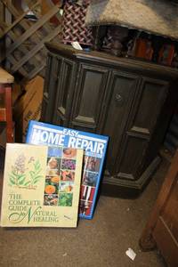 lot 49 image: Side table gardening and home repair books and more