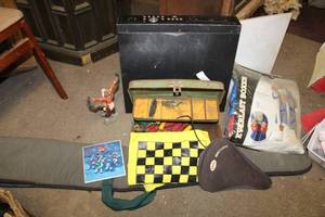 lot 65 image: Mixed lot of Ammo, tackle box, gun case, costume, Native American statue and more.